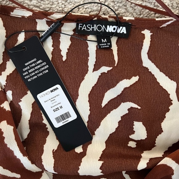 NWT FASHION NOVA SHE’S AN ANIMAL MINI DRESS. SIZE M - Picture 8 of 8